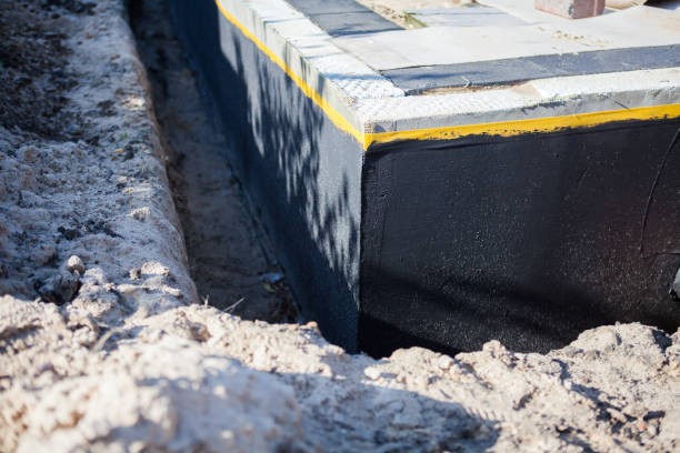 Professional Waterproofing technician working in Dumfries, VA